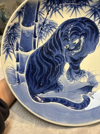 A large Japanese Arita blue and white 'Tiger' dish, Fuuki Chousun 富貴長春 mark, late Edo to early Meiji, 18/19th C.