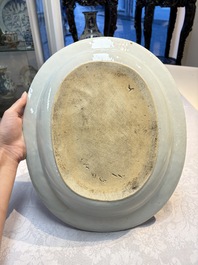 Two Chinese blue and white chargers with floral and landscape design, Qianlong