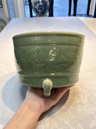 A large Chinese Longquan celadon tripod censer with floral design, Ming