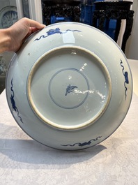 A large Chinese blue and white 'Lotus Scroll' dish, Kangxi