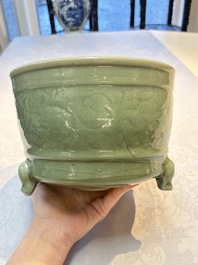 A large Chinese Longquan celadon tripod censer with floral design, Ming