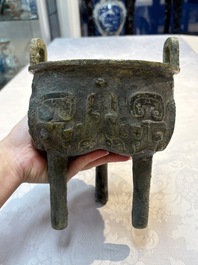 A Chinese archaic bronze food vessel with Taotie design, 'Ding 鼎', late Shang