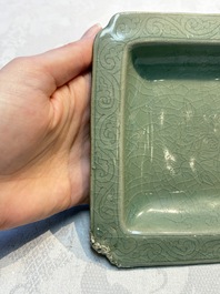 A fine Korean celadon square dish with incised floral design, Goryeo, 12th C.