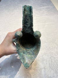 A Chinese archaic bronze wine vessel with Taotie design, Jue 爵, late Shang