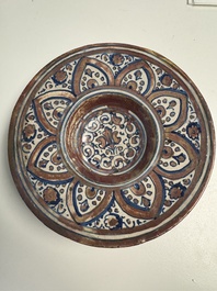An Italian maiolica lustreware deep plate, Gubbio, 16th C.