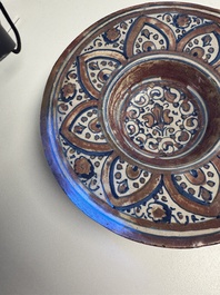 An Italian maiolica lustreware deep plate, Gubbio, 16th C.