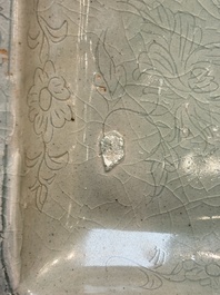 A fine Korean celadon square dish with incised floral design, Goryeo, 12th C.