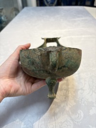 A Chinese archaic bronze pouring vessel, Yi 匜, Warring States period/Han