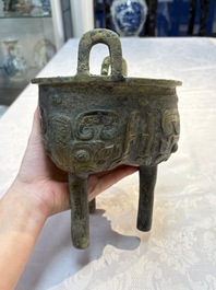 A Chinese archaic bronze food vessel with Taotie design, 'Ding 鼎', late Shang