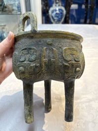 A Chinese archaic bronze food vessel with Taotie design, 'Ding 鼎', late Shang