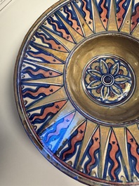 An Italian maiolica lustreware deep plate, Gubbio, 16th C.