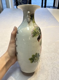 A Chinese famille rose vase with bird among flowering branches, signed Hu Qifa 胡啟發, 19/20th C.