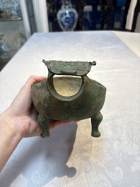 A Chinese archaic bronze pouring vessel, Yi 匜, Warring States period/Han