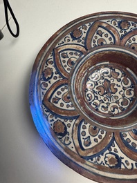 An Italian maiolica lustreware deep plate, Gubbio, 16th C.