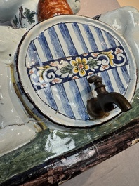 A massive polychrome French faience 'Bacchus' table fountain, Rouen, 18th C.