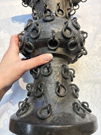 A Chinese archaistic bronze 'Zun' vase with 99 rings, 18/19th C.