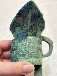 A Chinese archaic bronze wine vessel, Jiao 角, Shang/Zhou