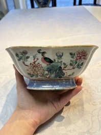 A Chinese famille rose tazza, a blue and white vessel and an enamelled Yixing stoneware teapot, 19th C.