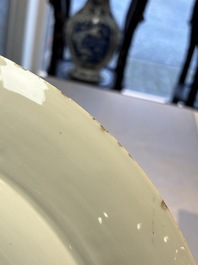A large Chinese blue and white gilt-decorated dish with birds and insects among bamboo and peonies, Yongzheng
