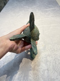A Chinese archaic bronze wine vessel with Taotie design, Jue 爵, late Shang