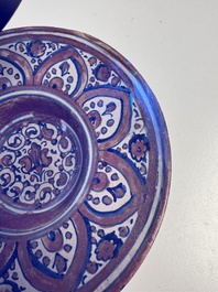 An Italian maiolica lustreware deep plate, Gubbio, 16th C.