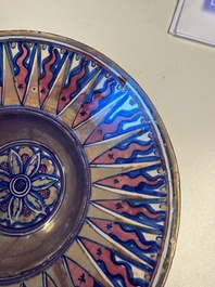 An Italian maiolica lustreware deep plate, Gubbio, 16th C.
