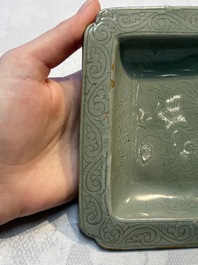 A fine Korean celadon square dish with incised floral design, Goryeo, 12th C.