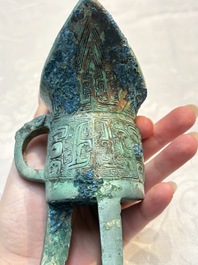 A Chinese archaic bronze wine vessel, Jiao 角, Shang/Zhou