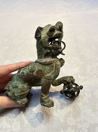 A pair of Vietnamese bronze lions, 19/20th C.