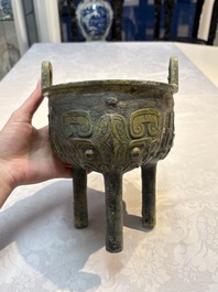 A Chinese archaic bronze food vessel with Taotie design, 'Ding 鼎', late Shang