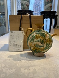A rare Chinese sancai 'Phoenix' ewer with a wooden box, Liao