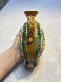 A rare Chinese sancai 'Phoenix' ewer with a wooden box, Liao