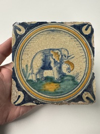 A polychrome Dutch Delft maiolica 'Elephant' medallion tile, 16th C.