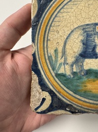 A polychrome Dutch Delft maiolica 'Elephant' medallion tile, 16th C.