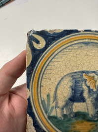 A polychrome Dutch Delft maiolica 'Elephant' medallion tile, 16th C.