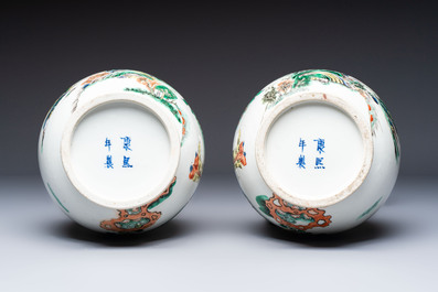 A pair of Chinese famille verte vases with narrative design, 19th C.