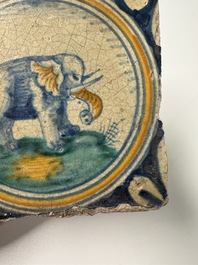 A polychrome Dutch Delft maiolica 'Elephant' medallion tile, 16th C.