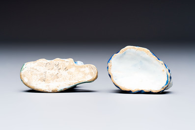 Two polychrome Dutch Delft miniature models of animals, a 'Pineapple' stand and a pair of blue and white plates, 18th C.