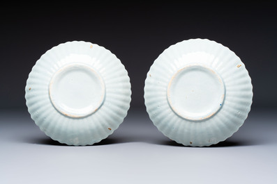 Two polychrome Dutch Delft miniature models of animals, a 'Pineapple' stand and a pair of blue and white plates, 18th C.