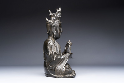 A fine Chinese bronze figure of Bodhisattva holding a ruyi, Ming
