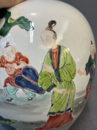 A Chinese famille rose 'Ladies and Boys' jar, Yongzheng/Qianlong