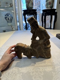 A Chinese sandstone 'Bai Ma Shi Zu 白馬舐足' carving, Northern Wei