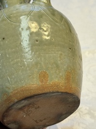 A fine Chinese Yueyao green-glazed chicken-head ewer with dragon-form handle, Southern Dynasties