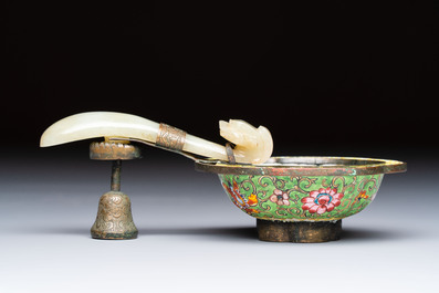 A Chinese celadon jade belt hook mounted as a handle on a Canton enamel bowl, Qing