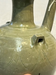 A fine Chinese Yueyao green-glazed chicken-head ewer with dragon-form handle, Southern Dynasties