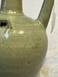 A fine Chinese Yueyao green-glazed chicken-head ewer with dragon-form handle, Southern Dynasties