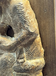 A Chinese sandstone 'Bai Ma Shi Zu 白馬舐足' carving, Northern Wei