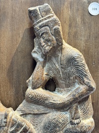 A Chinese sandstone 'Bai Ma Shi Zu 白馬舐足' carving, Northern Wei