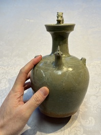 A fine Chinese Yueyao green-glazed chicken-head ewer with dragon-form handle, Southern Dynasties