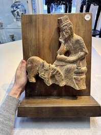 A Chinese sandstone 'Bai Ma Shi Zu 白馬舐足' carving, Northern Wei